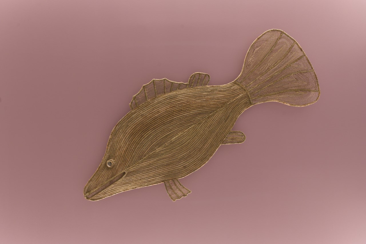 A weaving artwork depicting a fish.