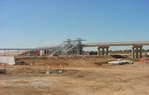 Construction of the elevator towers, platform and Kiss & Ride facility of the Mawson Interchange, and the Elder Smith Road bridge in January 2006. 